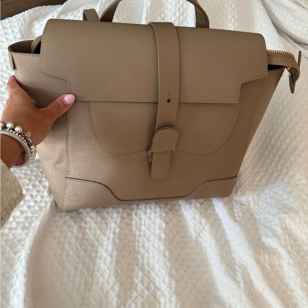 Senreve Tan Leather Backpack with Modern Design